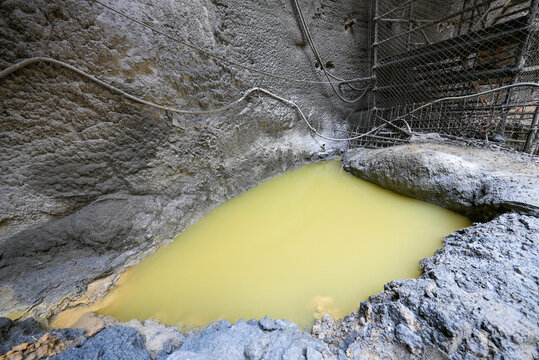 Contaminated Water Pool in an Industrial Excavation Site