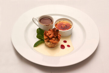 Gourmet Dessert Plate Espresso Bread Pudding Creme Brûlée White Sauce Mint