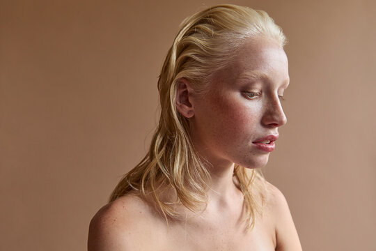 Beautiful freckled model in studio