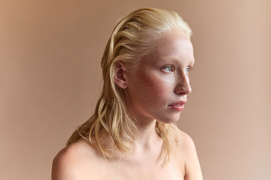 Beautiful freckled model in studio