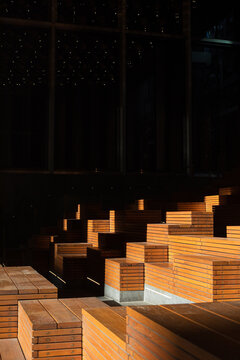 Dramatic Light Across Wooden Seating Steps in Melbourne Australia