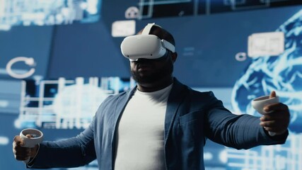 Black businessman using advanced technology VR headset tools to explore data science, automation and AI ethics in a digital data processing environment. Works on machine learning. Camera B. - Powered by Adobe