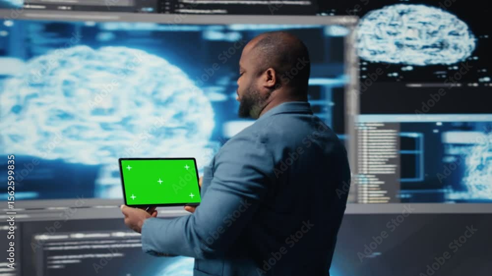 Poster african american it specialist shows tablet with chroma key screen and terminal window in the backgr