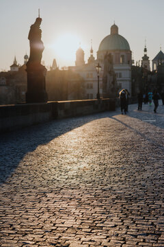 Sunrise on Historic Stone Bridge with Statues