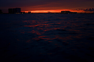 Sunrise or sunrise overlooking the sea and a line of hotels in Cancun