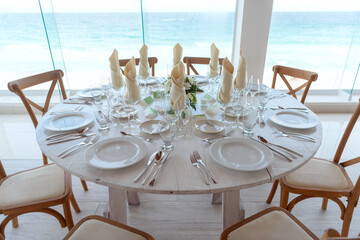 elegant banquet tables prepared for a conference or a party indoors