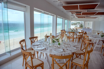 elegant banquet tables prepared for a conference or a party indoors
