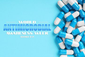World antibiotic awareness week. Many pills on light blue background, flat lay