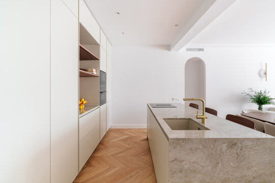 Marble kitchen island and sleek cabinetry design
