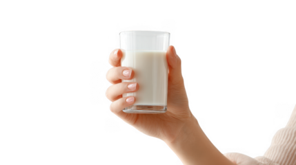 A close-up view of a hand holding a clear glass of fresh milk against a plain white background. symbolizing health. nutrition. and everyday life. suitable for food-related content or wellness themes