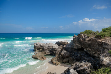 The coastline of the Caribbean Sea with white sand and rocks