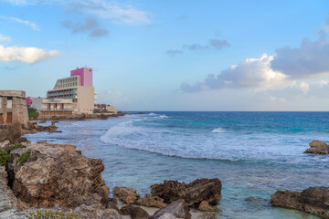 The coastline of the Caribbean Sea with white sand and rocks