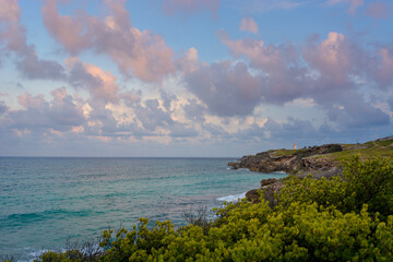 The coastline of the Caribbean Sea with white sand and rocks