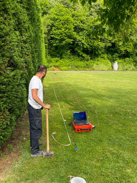 An Engineer Taking Geophysical Seismic Measurements