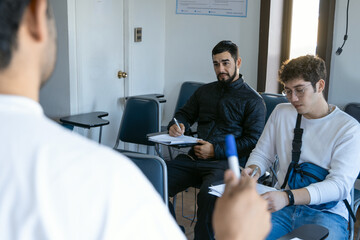 Fototapeta premium Teacher explaining lesson in front of class