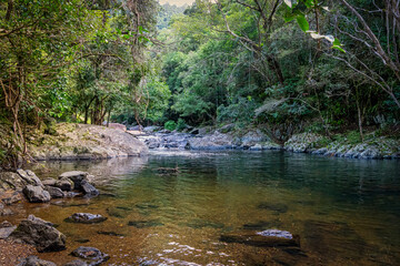 Crystal Cascades is a freshwater creek. The area features numerous cascade waterfalls and swimming holes in a rainforest habitat