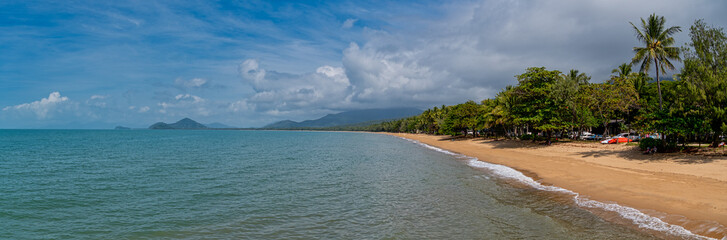 Palm Cove is a tiny enclave of fine dining, luxury resorts and spectacular pools beside a palm fringed beach.