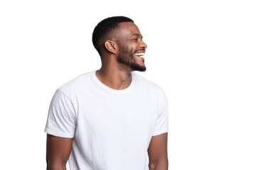 A joyful young man with a beard and short hair. wearing a plain white t-shirt. smiling against a light gray background. capturing a moment of happiness and positivity