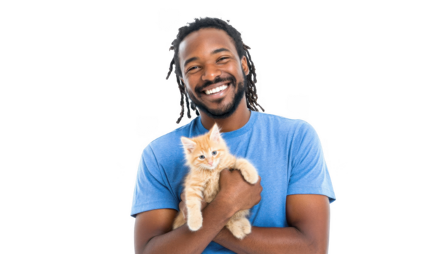 A joyful man with dreadlocks smiles while holding an orange kitten close to his chest. set against a clean white background. capturing a moment of affection and companionship