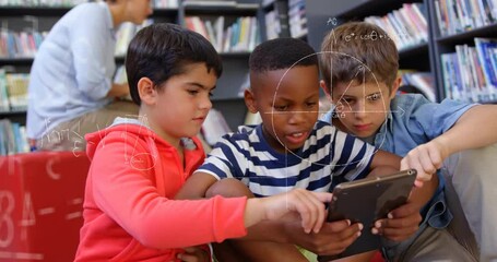 Three children tapping tablet and initiating floating math formulas for learning in library - Powered by Adobe