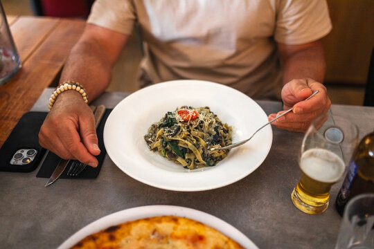ugc image of a man eating in a restaurant