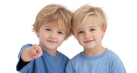Two young boys with blonde hair wearing matching blue t-shirts. smiling and playfully posing against a white background. ideal for family-oriented marketing or children's product promotions