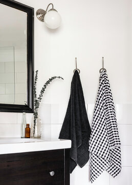 Bathroom vanity with hanging towels
