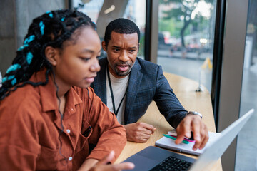 Student receiving guidance from professor