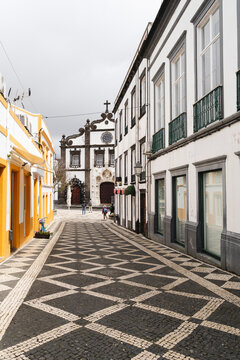 Cobbled street leading to church in Ponta Delgada