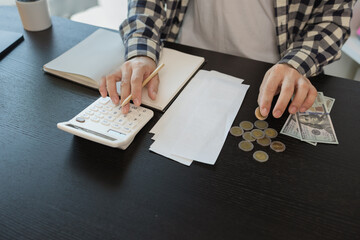 he is calculating the amount of money from all his income to allocate to various monthly expenses,...