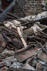 Collapsed abandoned house with scattered wood and bricks seen from multiple angles