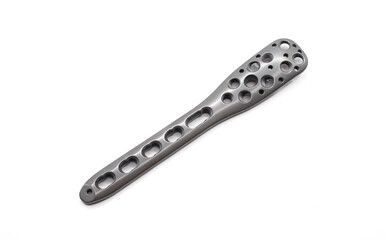 Proximal Humerus plate on white background with multiple holes for screw insertion for lengthening to treat fractures