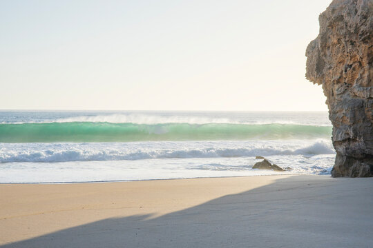 Sand stone cliff and wave. Yorke Peninsula. South Australia. - Powered by Adobe
