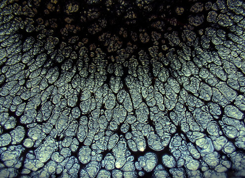 Textured background of microscopic glaze of Chinese ceramics tea cup
