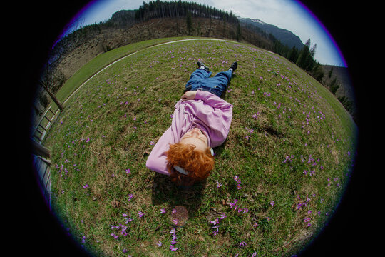 Portrait of a relaxing guy on a fisheye lens