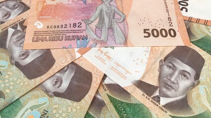 Indonesian money, close up five thousand rupiah,5000 banknotes scattered 