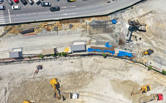 Aerial View of an Active Construction Site with Machinery in Operation