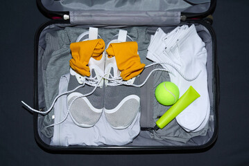Preparing for an active trip with sports gear and essentials