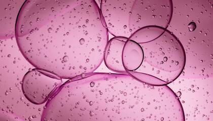 Abstract 3d render of Pink Oil Drops in Liquid Suspension