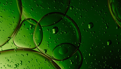 Abstract Green Liquid Bubbles with Suspended Particles and Light Refra