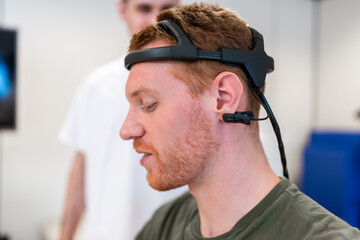 Doctor analyzing patient brain activity with innovative