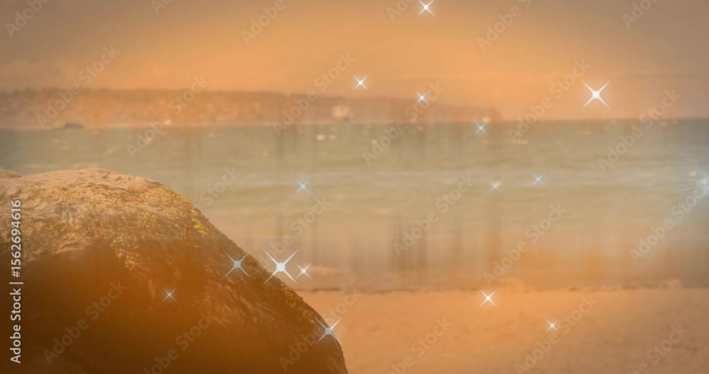 Poster sparkles appearing and drifting while pulsing over beach for dynamic background effect