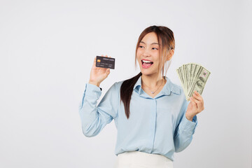 Happy excited woman holding cash credit card and money dollar fan, showing payment money option with smile, expressing confidence in financial freedom and shopping choices. isolated white background