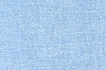 Close-up of a light blue linen fabric texture