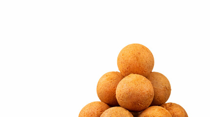 Traditional Colombian buñuelos on a white background - Typical Colombian cuisine