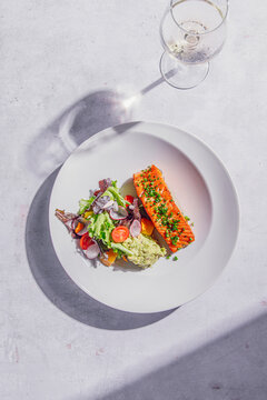 Octopus with creamy mashed potatoes, paprika oil and black salt
