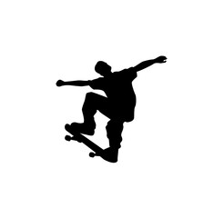 Silhouette of a skateboarder performing an aerial trick, mid-air with outstretched arms.