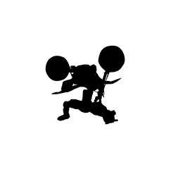 A motocross rider performs a daring wheelie, showcasing extreme athleticism and skill.