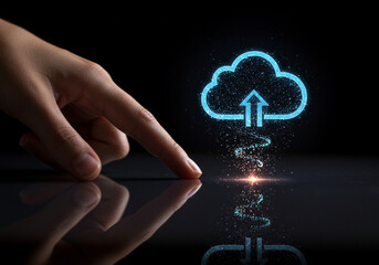 Hand pointing at glowing cloud upload icon