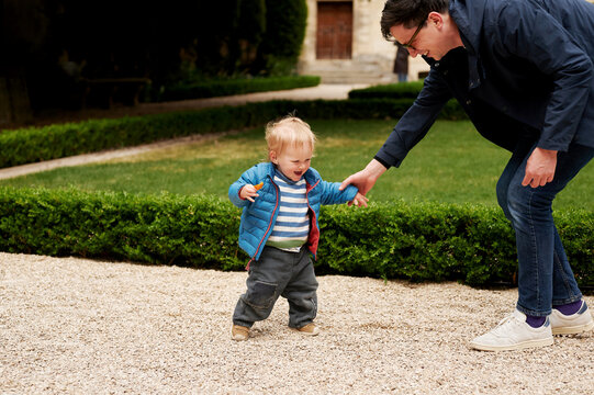 father and son in paris park